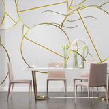 Modern gold geometric wallpaper in master bedroom making space feel larger