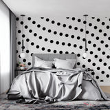 Gold dot pattern creating stunning hallway feature wall with ambient lighting