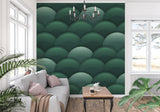 Green geometric scale wallpaper making a stunning statement in a modern living room with natural light