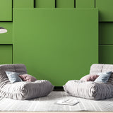 Modern green 3D geometric block wallpaper in a minimalist home office, creating depth and visual interest