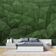 Modern living room featuring green geometric triangle wallpaper creating depth and dimension