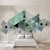 Contemporary home office featuring geometric triangle wallpaper in soothing mint tones