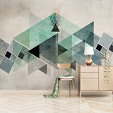 Modern bedroom with mint green geometric accent wall