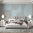 Modern geometric wallpaper with curved patterns creating a calm atmosphere in a minimalist living room