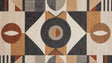 Modern geometric wallpaper mural showcasing bold art deco pattern in contemporary living room with grey sofa and brass accents