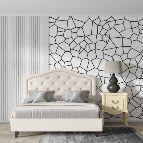 Modern geometric wallpaper in minimalist living room showing black and white pattern
