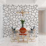 Black and white geometric wall mural in contemporary office space
