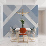 Blue-grey geometric pattern wall mural in a minimalist home office setup