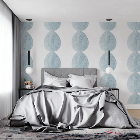 Modern blue circle wallpaper in a bright Scandinavian living room, showing geometric pattern flow