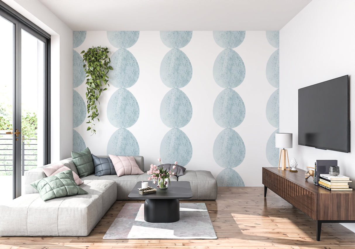 Geometric blue circle wall design in a contemporary bedroom setting