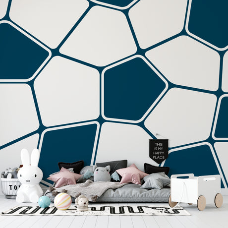 Modern geometric wallpaper in bright home office with white desk and natural light