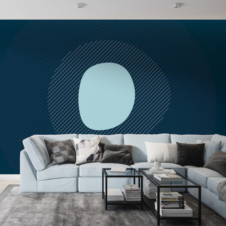 Modern geometric circle wallpaper in a bright living room, showing smooth lines and blue tones creating depth