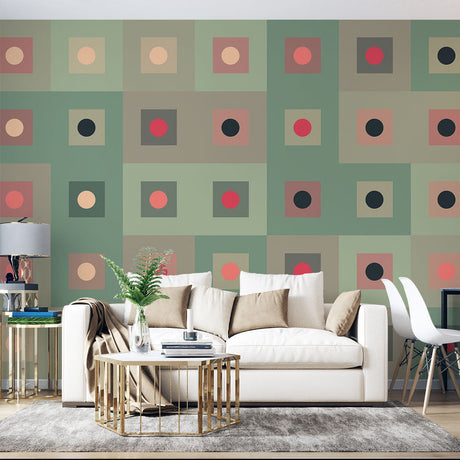Geometric pattern wallpaper bringing modern style to a minimalist living room with sage and coral accents