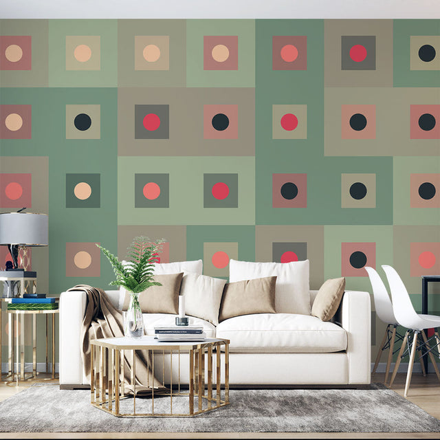 Geometric pattern wallpaper bringing modern style to a minimalist living room with sage and coral accents