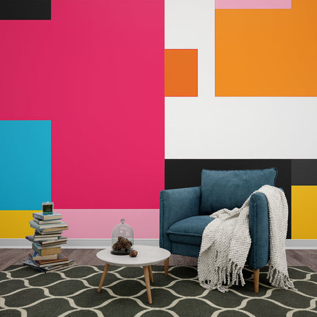 Geometric color block wallpaper mural in bright modern living room with minimalist furniture and natural light