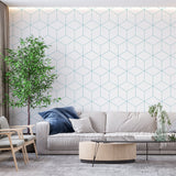 Modern cube pattern wallpaper in a bright office space, showing 3D geometric design in soft blue