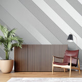 Geometric wallpaper installation in hallway showing full wall coverage