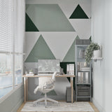 Geometric green wall mural creating depth in dining room space