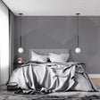 Modern grey geometric wallpaper in minimalist living room showing clean lines and contemporary design