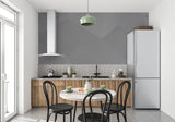 Grey geometric accent wall in dining room highlighting architectural elements