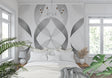 Modern grey geometric wallpaper in a minimalist living room setting with natural light