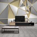 Modern office space featuring geometric pattern wallpaper in grey and gold
