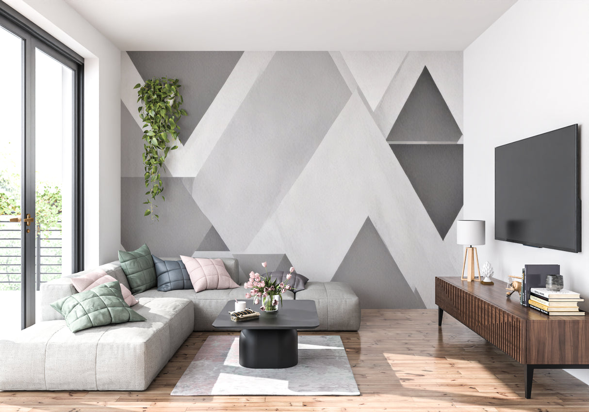 Modern geometric grey wallpaper in a minimalist living room with natural light and clean furniture lines