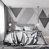 Grey geometric wall mural bringing depth to a modern home office setup