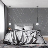 Geometric diamond wallpaper adding visual interest to a modern dining room