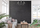 Geometric grid wallpaper adding depth to modern bedroom walls