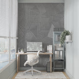 Bedroom with modern grey geometric wallpaper showing linear pattern detail