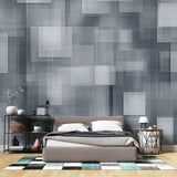 Modern grey geometric wallpaper in a minimalist office space, creating a clean and professional atmosphere