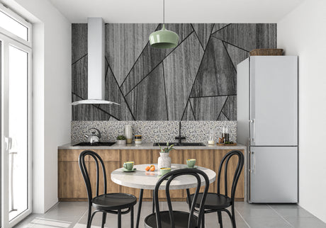 Modern geometric stone wallpaper in contemporary living room showing angular grey pattern and clean lines