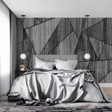 Grey geometric wall mural creating depth in minimalist office space