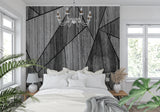 Geometric grey wallpaper making statement in modern bedroom setting