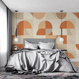 Orange and beige circle pattern wallpaper in modern home office setup