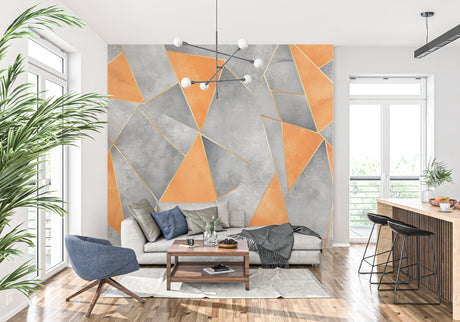 Modern geometric wallpaper with orange and grey design showcased in a minimalist living room setting