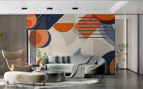 Modern geometric wallpaper with orange and navy shapes creating drama in a minimalist living room