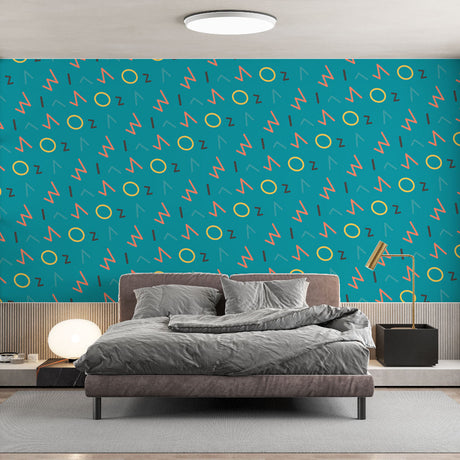 Modern geometric wallpaper in a bright home office space, showing coral and yellow pattern creating an energetic workspace atmosphere
