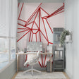 Modern geometric red line wallpaper in a minimalist living room with white sofa and natural light