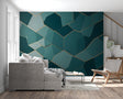 Modern geometric teal and gold wallpaper in a bright contemporary living room setting