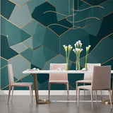 Teal and gold geometric wallpaper making a statement in home office space