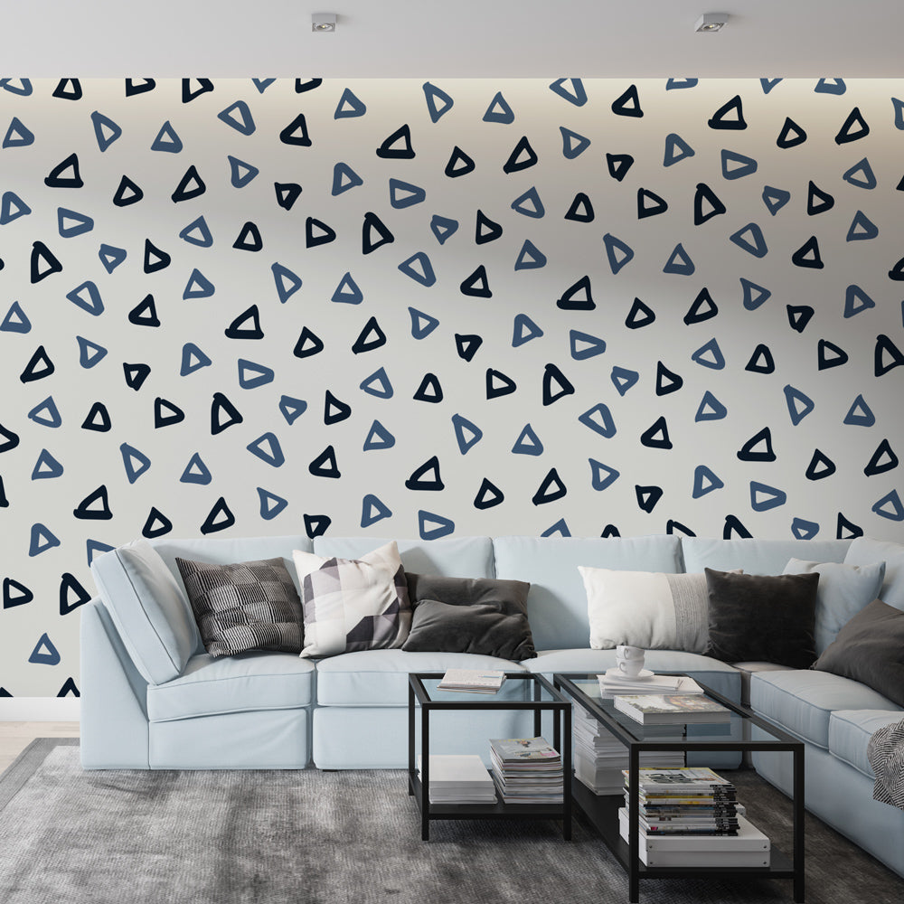 Modern geometric triangle wallpaper in blue tones bringing fresh style to a minimalist home office setup