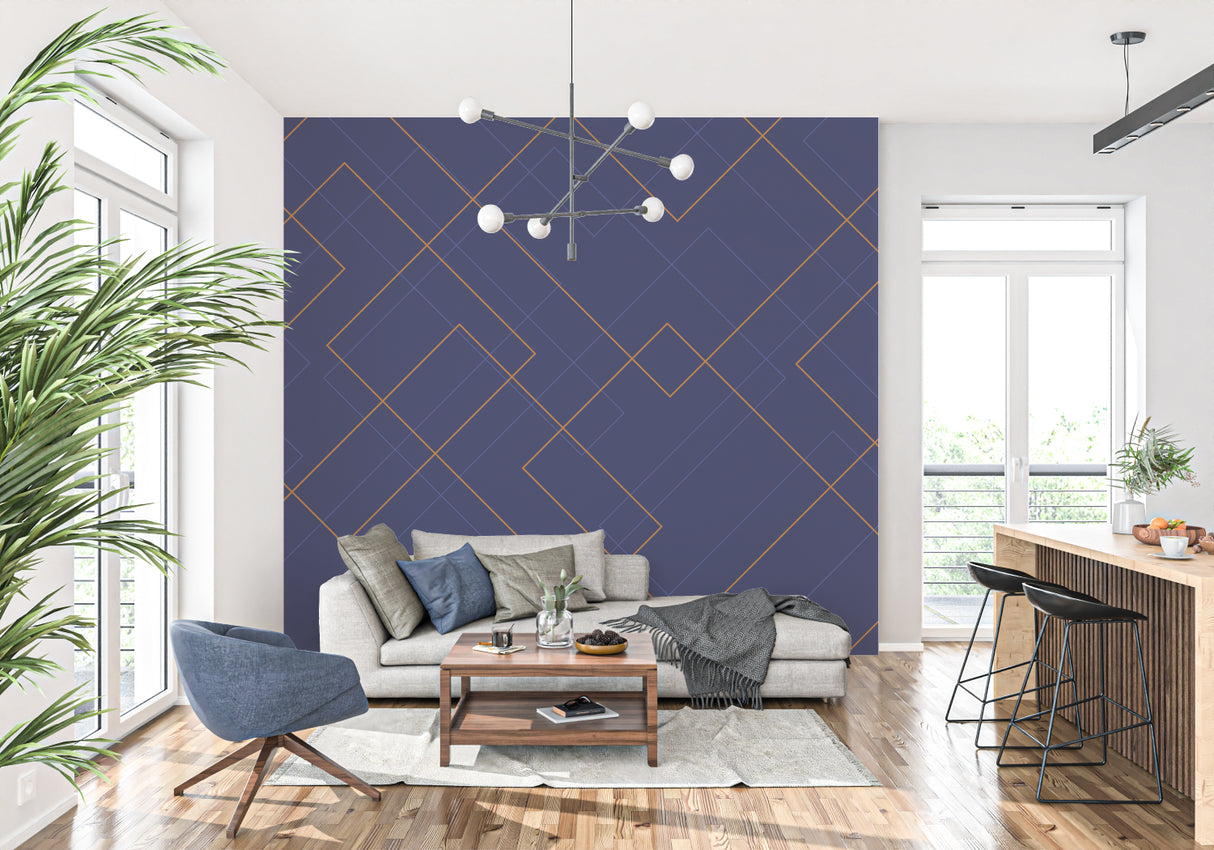 Home office with navy blue geometric wallpaper accent wall and modern desk setup