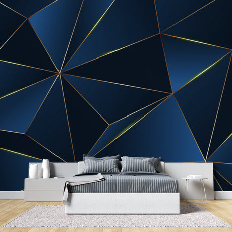 Modern geometric wallpaper with navy and gold pattern in a stylish living room setting