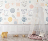 Abstract shapes wallpaper bringing gentle colors to a teen study space