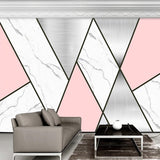 Angular geometric wallpaper with marble accents displayed in a modern home office space