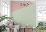 Pink and mint geometric wall mural creating depth in a contemporary bedroom
