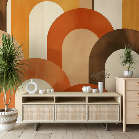 Geometric arch wallpaper in terracotta and beige tones creating a warm, modern atmosphere in a minimalist living room