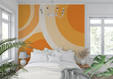 Retro geometric wallpaper in a sunny home office with white desk
